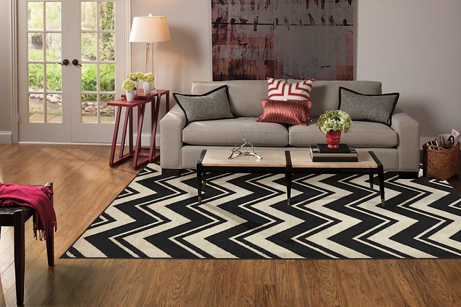 Area rug to bring the room together, add comfort, character  and style
